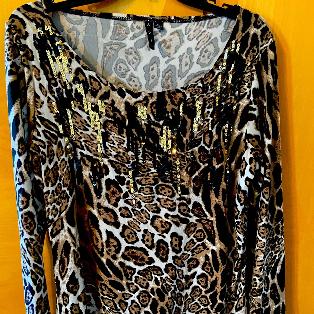 Leopard print top.